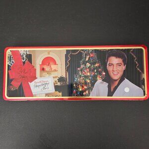 Russell Stover “Happy Holidays Elvis” Candy Tin (1999 Indoor Christmas Scene)
